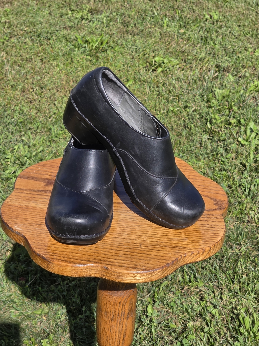 Dansko Black Leather Slip-On Clogs